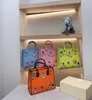 Bolsas de mão luxuosas de designer de moda tecidas à mão impressão de planeta espacial com material de couro genuíno bolsas de compras de designer 33*28 cm