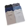 Polos pour hommes MVLYFLRT 2023 T-shirt tricoté à manches courtes et col polo printemps 100 pull en laine mérinos raffinée MV9528 230720