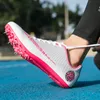 Chaussures de sécurité Les blancs d'athlétisme de l'athlétisme de Spike Men's Spike.