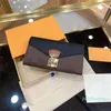 Designer -Luxury high-end classic letter pattern wallet with frame ladies leather rectangular flip wallet clutch