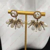 Metal braided tracing pearl earrings inlaid with zircon pearl fan shaped pendant, retro luxury banquet