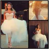 2018 Gorgeous Sweetheart Neckline Sleeveless Pearls Pärled Tulle High Low Wedding Dresses Short Beach Bridal Wedding Dress263V