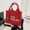 Bolsa feminina masculina de luxo Jocobs estilo cowboy Cool Bolsas de mão de grande capacidade para compras Corpo cruzado Bolsa de viagem em lona quadrada Bolsas de compras Bolsas de ombro