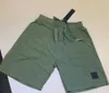 Praia 2023 Shorts Verão Masculino Calça Curta Moda Correndo Solto Secagem Rápida Processo de Lavagem de Tecido Puro Moderno Casual Hip-hop Ins Stones Island Motion atual 63ess