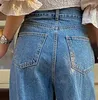 Jeans pour femmes à la mode rue irrégulière bouton taille haute à la mode dame droite Denim vadrouille pantalon