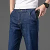 Mäns jeans 2023 Spring Summer Classic Pocket Men Fit rak tunt Loose Cotton Middle midja affärer med lätta byxor