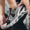 Scarpe da corsa per ragazzi Sneakers casual da uomo Scarpe da ginnastica sportive traspiranti Suola lama Scarpe da passeggio alla moda blu nero grigio