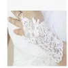 Fingerlose kurze Hochzeitshandschuhe aus Spitze mit Pailletten und Perlen für die Braut, Hochzeit, Brauthandschuh auf Lager287P