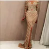 Yousef Aljasmi 2021 Vestidos de Noite Sereia Luxo Manga Longa Champanhe Lantejoulas Sexy Transparente Gola De Jóia Dividida Frente Vestidos de Baile Cus182s