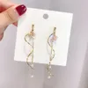 Boucles d'oreilles pendantes 2023 tendance perle vague longue gland pour les femmes cristal fleur personnalité mode fête mariage bijoux cadeaux