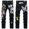 Mens 청바지 고민 오토바이 자전거 타는 사람 Jean Graffiti Rock Skinny Slim Ripped Hole Letter 인쇄 데님 바지 청바지