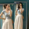 Abiti da lavoro 2023 Summer Blue Ice Silk Top A Word Vita alta White Half-body Skirt Set Female Drape Korean