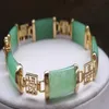 Hübsches, natürliches, mit grünem Jade-Edelstein vergoldetes Glücks-Glücksglied-Armband248Y