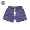 Mannen Shorts Snoep Kleur Strand Elastische Band Effen Wijde Pijpen Korte Losse Driepunts Casual Broek Mannelijke Badmode Trunks S 3XL 230721