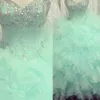 Nowe sukienki Quinceanera 2015 przez 15 lat z ukochanymi koralikami kryształami bez pleców marszczyków balowy podłoga długość organza mennica gree183p