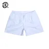 Mannen Shorts Snoep Kleur Strand Elastische Band Effen Wijde Pijpen Korte Losse Driepunts Casual Broek Mannelijke Badmode Trunks S 3XL 230721