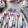 Robe de deux pièces Ensembles de fleurs de mode d'été Femmes à manches longues Revers Chemise à imprimé floral Tops + Mini-jupe plissée taille haute 2 Costume deux pièces 2023