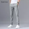 Herrbyxor plus storlek herr casual 2023 kpop stil män fritid smala fickor byxor grå khaki utomhus pant sportkläder man