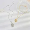 Niedliche Iced Out-Kubikzirkonia-minimalistische Mama-Buchstaben-Halskette für Damen mit Volldiamant und Ziffern-Blumenhalsband zum Muttertag, goldfarbene Anhängerkette, Schmuckhalsbänder für Frauen
