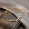 Bangle 2023 Fashion Trend Unique Design Elegant Exquisite Twist Simple Armband Women Jewelry Wedding Party Premium Gift Wholesale 230721