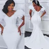 2020 Plus Size Arabic Aso Ebi Feather Crystals Sexy Wedding Dresses Deep V-neck Backless Bridal Dresses Mermaid Wedding Gowns ZJ02291e