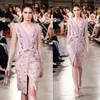 Georges Hobeika 2017 Abiti da sera spaccati Indossano scollo a V profondo Lunghezza al ginocchio Applique in pizzo Abiti da festa Manica lunga in cristallo Tappeto rosso D286c