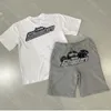 メンズサマーTシャツロンドンシューティングゲームトラップスターショートスーツ有名なデザイナー刺繍ビッグアイコンシャツカップルフーディージャケットダウンモーション現在558ess