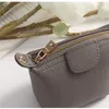 Femme tête couche peau de vache fermeture éclair petit sac carré pièce porte-clés mini boulette sac zéro argent bag247q