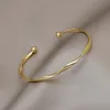 Bangle 2023 Fashion Trend Unique Design Elegant Exquisite Twist Simple Armband Women Jewelry Wedding Party Premium Gift Wholesale 230721