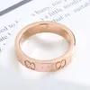 Lüksün tırnak yüzüğü erkek yüzüğü aşk yüzükleri tasarımcı moda titanyum çelik oyulmuş harf desen tasarımcısı mücevher nişan yüzüğü 5-11 halkalar için halkalar