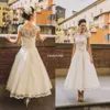 Abiti da sposa vintage retrò stile anni '50 2020 maniche ad aletta in pizzo con perline bottoni abito da sposa corto in organza con fascia alla caviglia256l