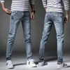 Jeans da uomo Taglia grande 2023 Primavera Plus Abbigliamento casual di marca Pantaloni larghi da uomo in denim grigio elasticizzato