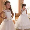 2019 Cute First Communion Dresses For Girls Scoop Backless Appliques Flower Girls Dress Bows Tulle Ball Gown Pageant Dresses For L252T