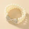 Nouveau Baroque Multicouche Imitation Perle Bracelet En Métal Or Arc Strass Charme Bracelets pour Femmes Parti Bijoux Accessoires1249z