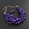 Серьги ожерелья устанавливают многослойные пурпурные бусин