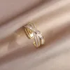 Anello regolabile di apertura delle donne eleganti dell'anello di zircone trasversale di placcatura in oro reale dei monili 14K di modo di nuovo disegno della Corea