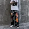 Pantaloni da uomo Stampa retrò Graffiti Pantaloni dritti larghi in denim Street Casual Gamba larga da uomo Hip Hop Cargo