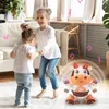 Novel Games Dancing Cow Musical Toys Educational Learning Swinging Robots Sound Light Niu Kids Gifts i 3 månader Baby 230721