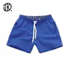 Mannen Shorts Snoep Kleur Strand Elastische Band Effen Wijde Pijpen Korte Losse Driepunts Casual Broek Mannelijke Badmode Trunks S 3XL 230721