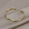 Bangle 2023 Fashion Trend Unique Design Elegant Exquisite Twist Simple Armband Women Jewelry Wedding Party Premium Gift Wholesale 230721