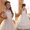 2019 Cute First Communion Dresses For Girls Scoop Backless Appliques Flower Girls Dress Bows Tulle Ball Gown Pageant Dresses For L252T