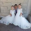 Abiti da ragazza di fiori in pizzo di classe con mezze maniche per matrimoni Appliqued Little Girls Pageant Dress Tulle Sweep Train A Line Commu251B