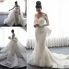 2021 Luxury Mermaid Wedding Dresses Sheer Neck Long Sleeves Illusion Full Lace Applique Bow Overskirts Button Back Chapel Train Go232a