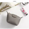 Femme tête couche peau de vache fermeture éclair petit sac carré pièce porte-clés mini boulette sac zéro argent bag247q