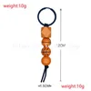 Sleutelhangers Lanyards Houten kralen Sleutelhanger Hanger Sport Basketbal Voetbal Honkbal Kwastje Kraal Sleutelhanger Sleutelhanger Drop Delivery Dheix