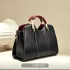 Ny stil modedesigner kvinnor väska högklassig kohud stor kapacitet handväska crossbody axel allt-i-en tygväska