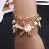 Charm Bracelets Natural Boho 팔찌는 Ocean Beach의 조수 중에 나타나는 불가사 껍질을 선택하고 손으로 체인으로 짜여집니다.