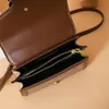 Название товара wholesale женские сумки на ремне нишевого дизайна, классическая сумка с принтом, флип-цвет, соответствующий резной пряжке, кошелек для монет для мобильного телефона, элегантные кожаные сумки с мягкой подкладкой 2009 Код товара