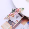 Horquilla con incrustaciones de diamantes de imitación de flores a la moda para mujer, joyería de lujo para mujer, Clip lateral de cristal, accesorios para el cabello de boda, tocados