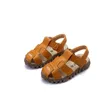Sandaler sommarbarn koreanska pojke sandaler barn baby strand sko krok slinga ihåliga nonslip skor för baby flicka pojke småbarnsko 230721
